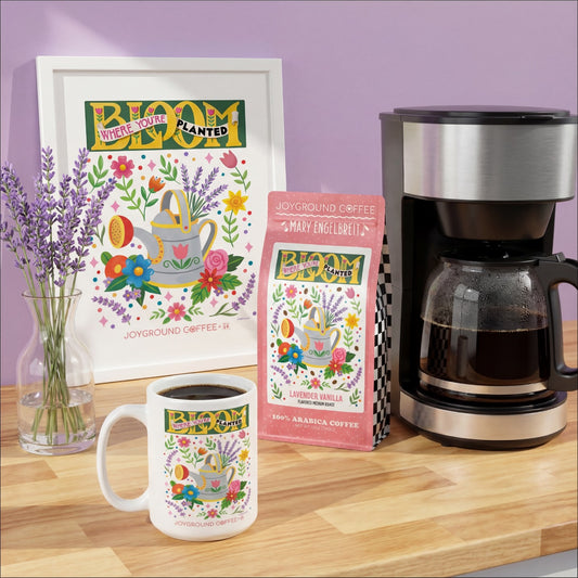 Mary Engelbreit Joyground Coffee Bloom Where You're Planted collection with coffee bag, mug, art print, coffee maker and lavender stems