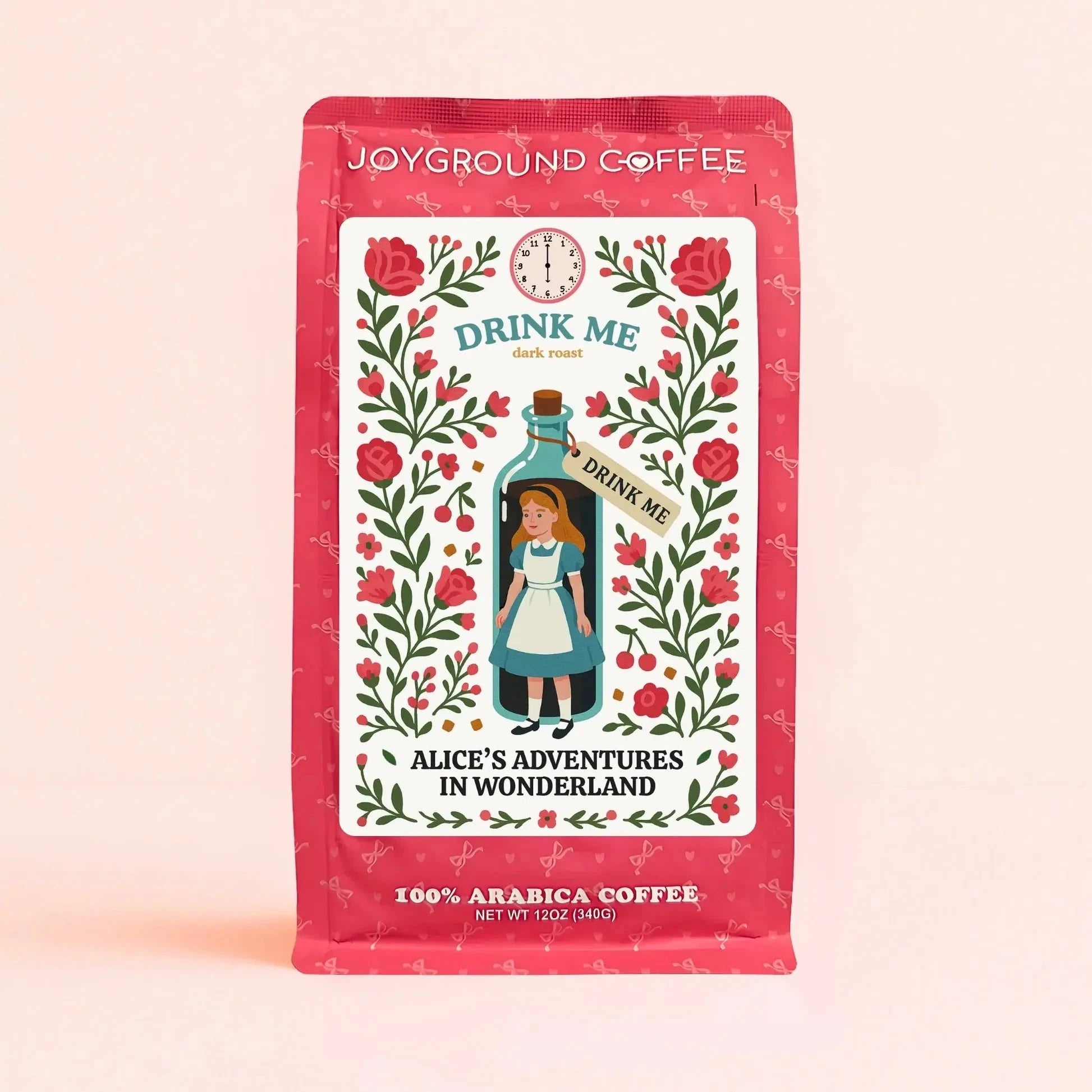 Alice in Wonderland Drink Me Dark Roast themed pink coffee bag