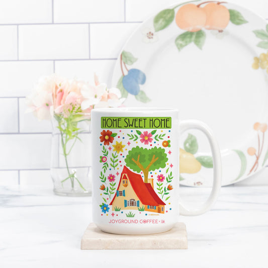 Mary Engelbreit Home Sweet Home white ceramic mug from Joyground Coffee