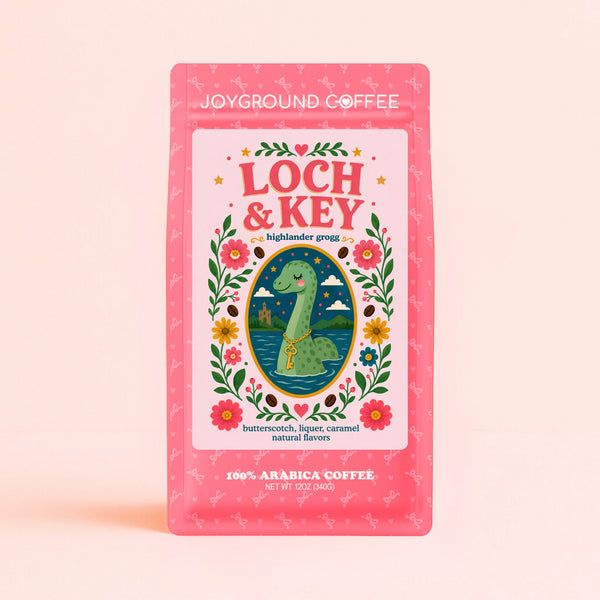 Joyground Coffee pink Loch & Key coffee bag with Nessie on it