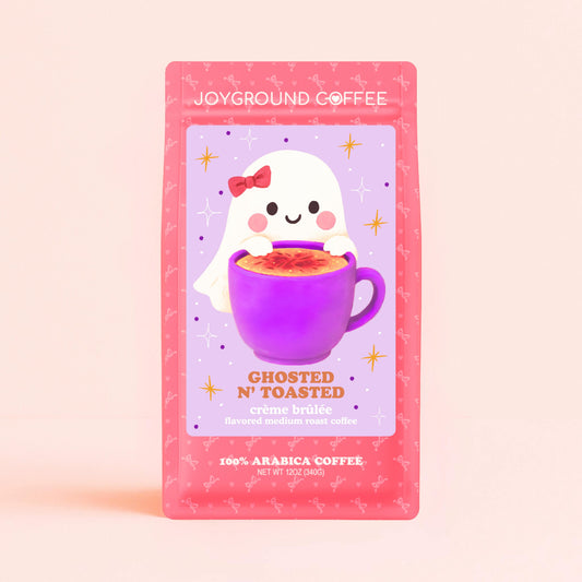 Joyground Coffee Ghosted n’ Toasted creme brulee naturally-flavored coffee beans with Pastel Halloween decor packaging