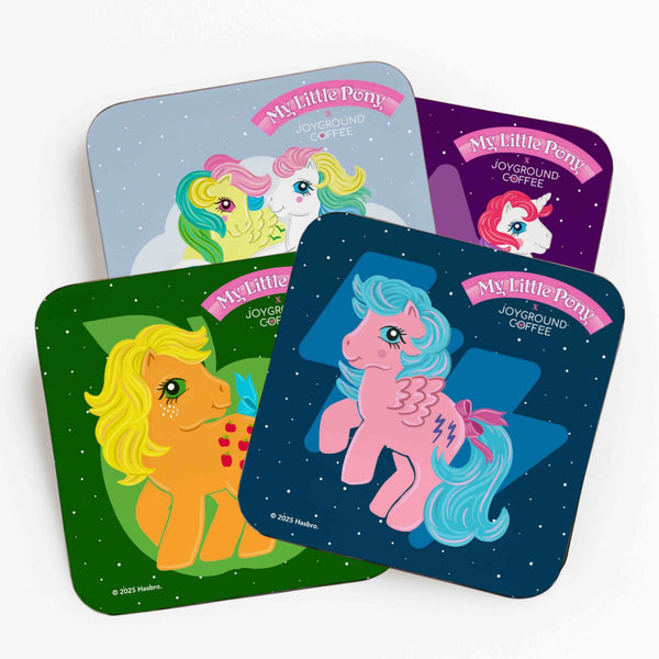 Four colorful Joyground Coffee coasters featuring My Little Pony characters on a white background.