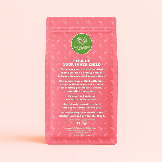 Joyground Coffee's cute pink coffee bag back with messaging to perk up your inner child for a nostalgic slow morning.