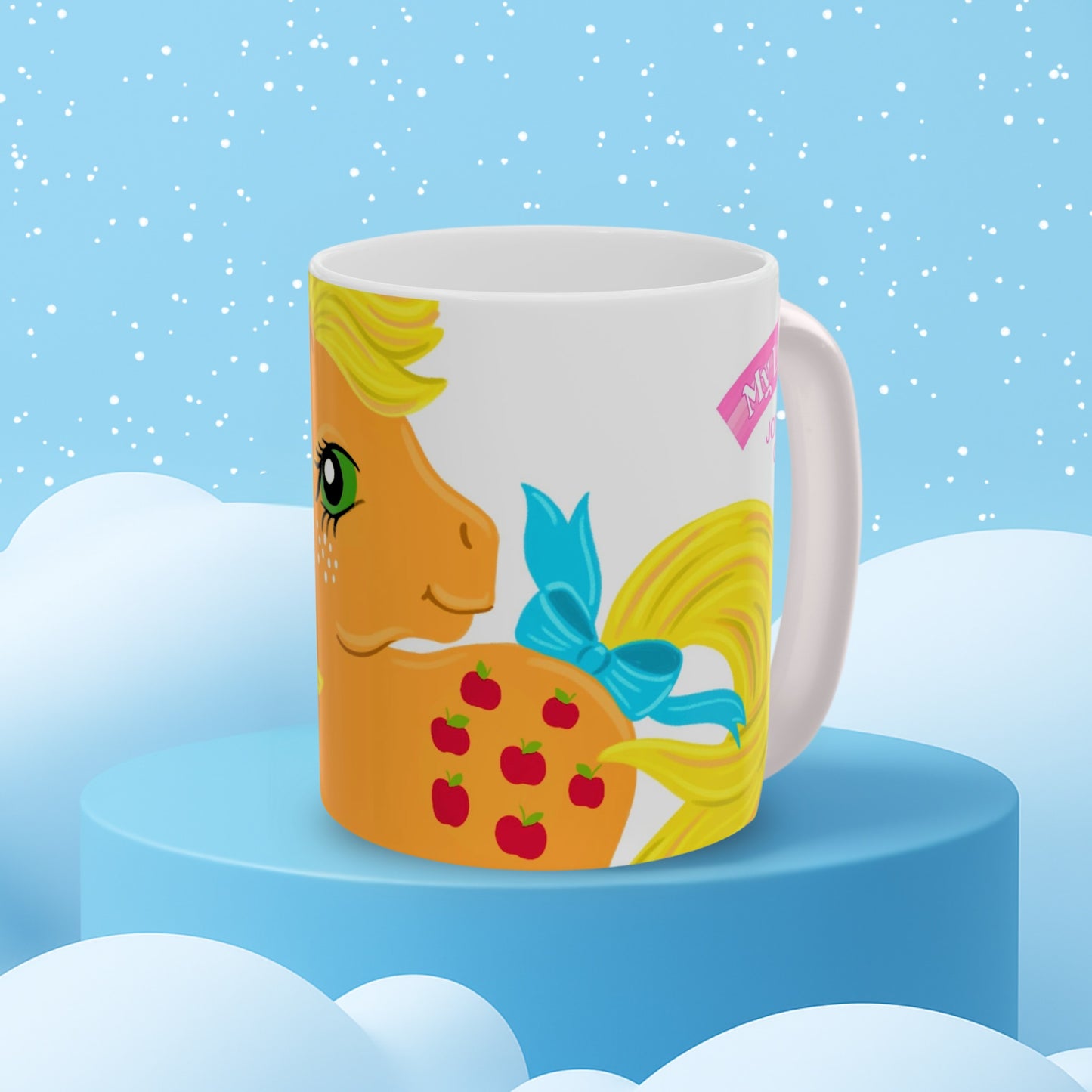 My Little Pony G1 Applejack white ceramic mug on a blue display with a snowy background.