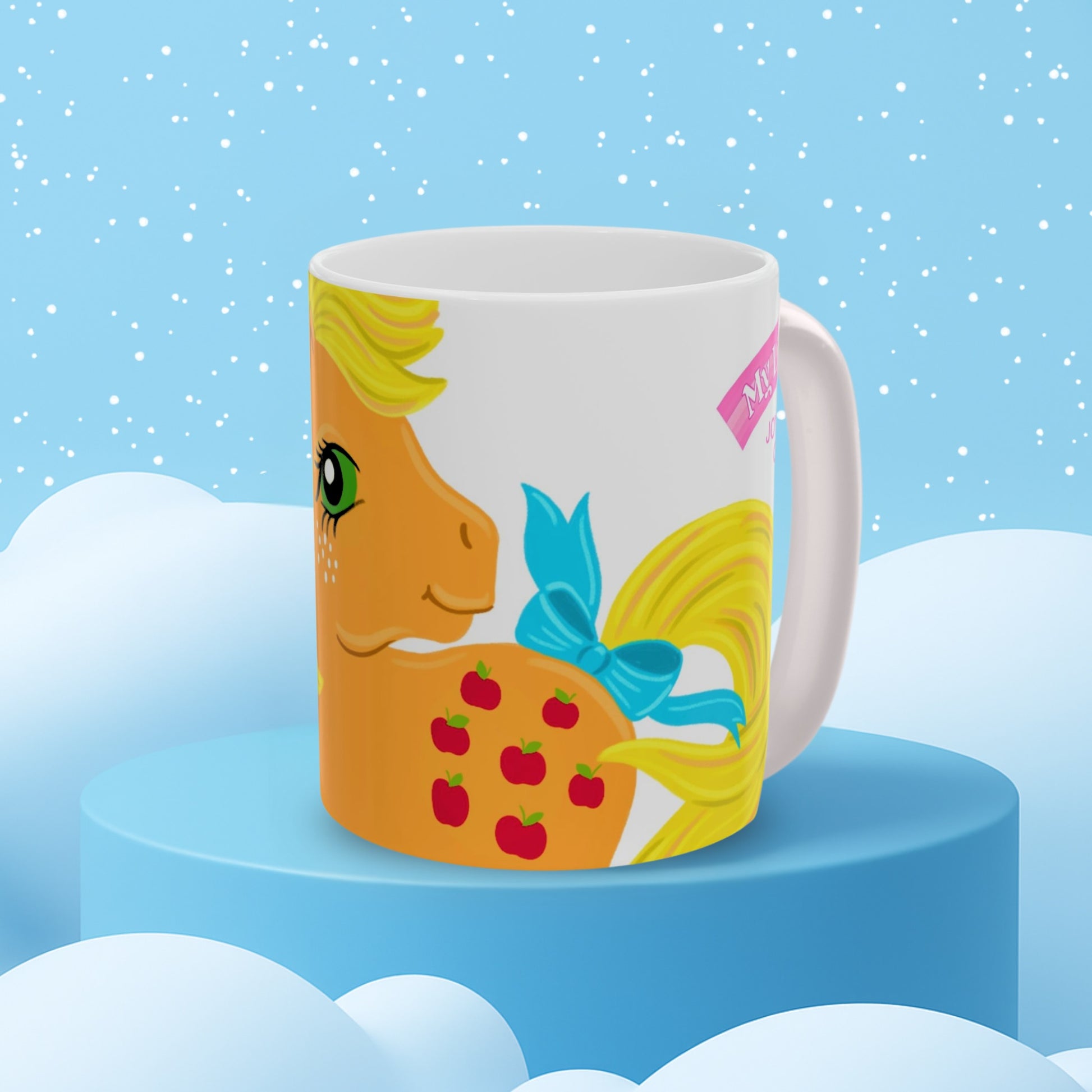 My Little Pony G1 Applejack white ceramic mug on a blue display with a snowy background.
