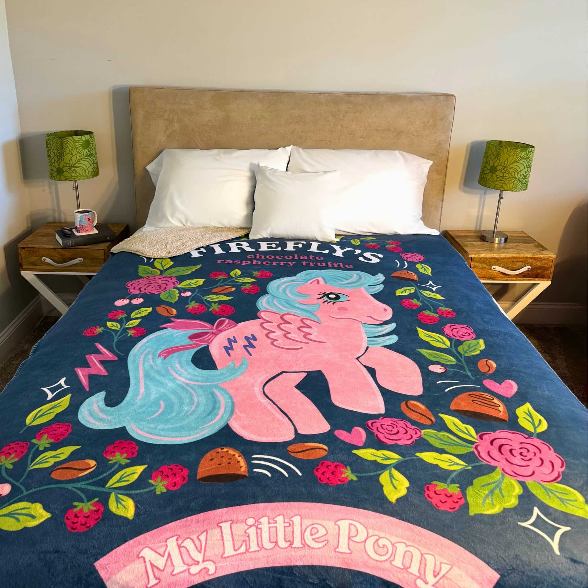 Queen bed with a My Little Pony-themed blanket featuring Firefly from MLP G1.