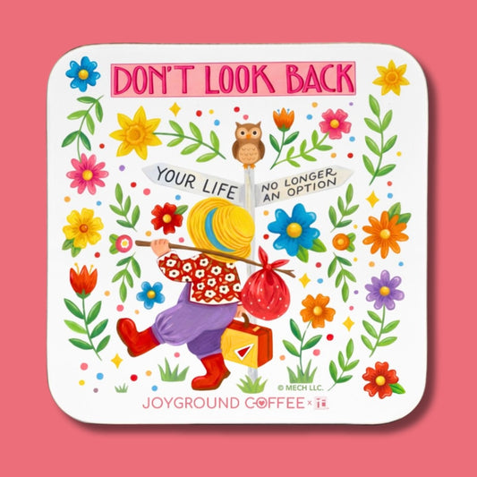 Colorful coaster with a Mary Engelbreit character and flowers on a pink background, featuring the text 'Don't Look Back'.
