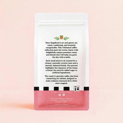 Joyground Coffee x Mary Engelbreit coffee bag back view on cream background.